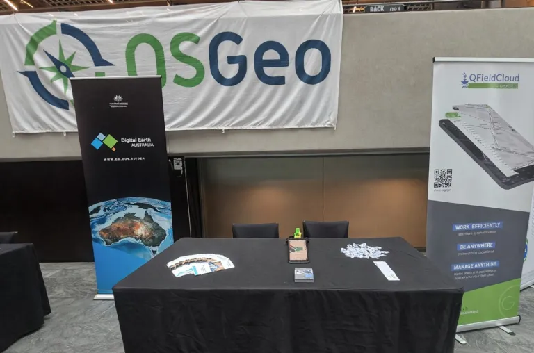 QField booth at FOSS4G 2025